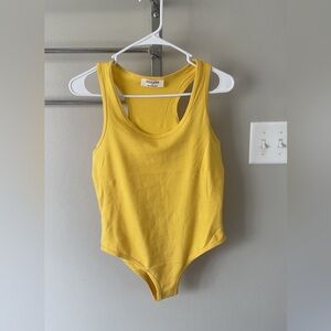 NWOT Zenana Outfitters Yellow One-Piece Bodysuit
